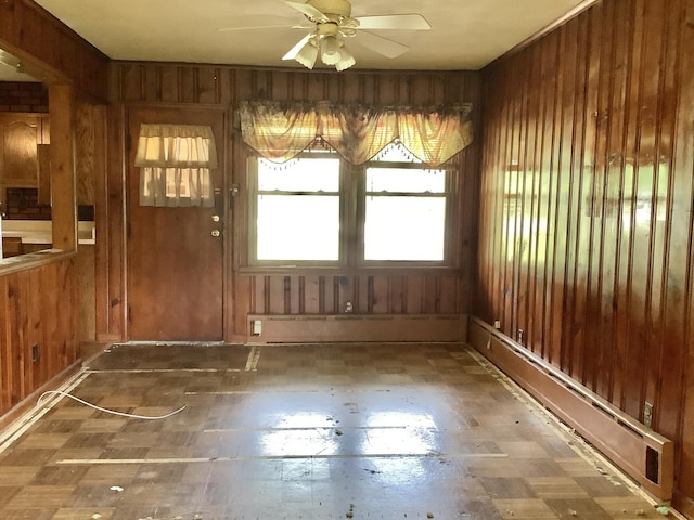 404 W Francis Rd, New Lenox, IL 60451 - unfurnished dining area with wood walls and ceiling fan