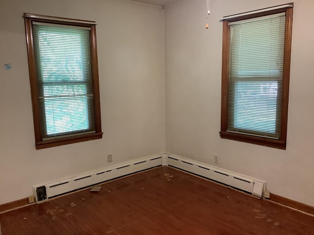 404 W Francis Rd, New Lenox, IL 60451 - unfurnished room featuring wood finished floors and a baseboard radiator