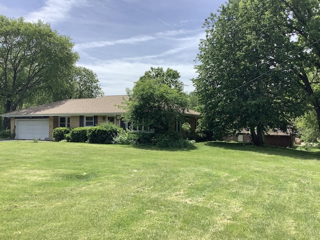 404 W Francis Rd, New Lenox, IL 60451 - view of front of property featuring a garage and a front lawn