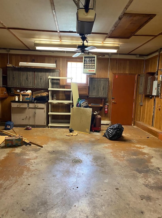 404 W Francis Rd, New Lenox, IL 60451 - garage featuring ceiling fan, wooden walls, and a garage door opener