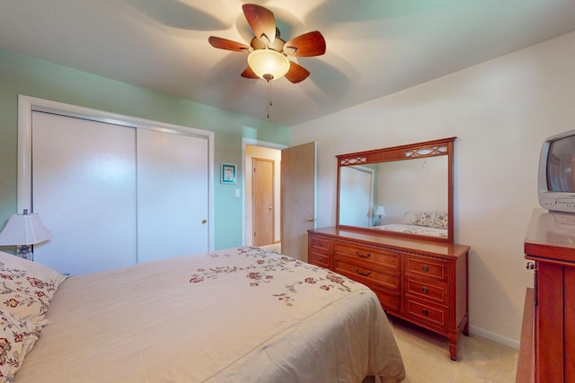 143 Scott Dr, East Dundee, IL 60118 - bedroom with light carpet, a closet, ceiling fan, and baseboards