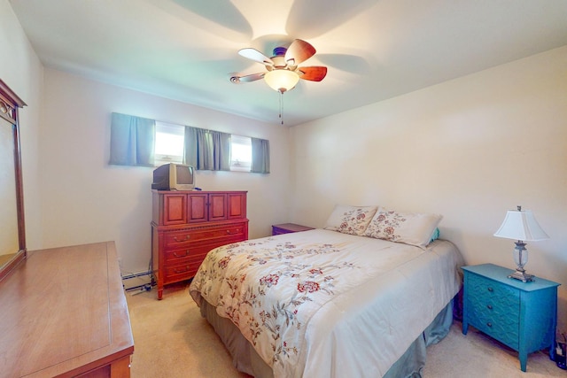 143 Scott Dr, East Dundee, IL 60118 - bedroom featuring a baseboard heating unit, light carpet, and a ceiling fan