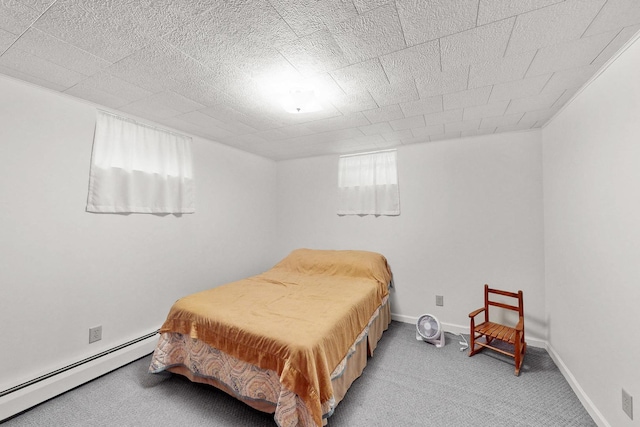 143 Scott Dr, East Dundee, IL 60118 - bedroom featuring baseboard heating, light carpet, and baseboards