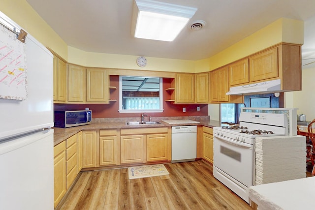 143 Scott Dr, East Dundee, IL 60118 - kitchen featuring white appliances, under cabinet range hood, a sink, light brown cabinets, and light wood-type flooring