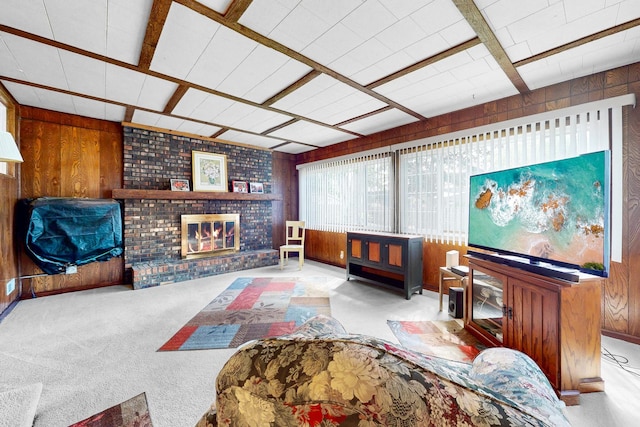 143 Scott Dr, East Dundee, IL 60118 - carpeted living area featuring wood walls and a brick fireplace