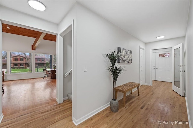 1520 Silver Maple Ct, Naperville, IL 60563 - corridor featuring baseboards, light wood-style floors, and beam ceiling