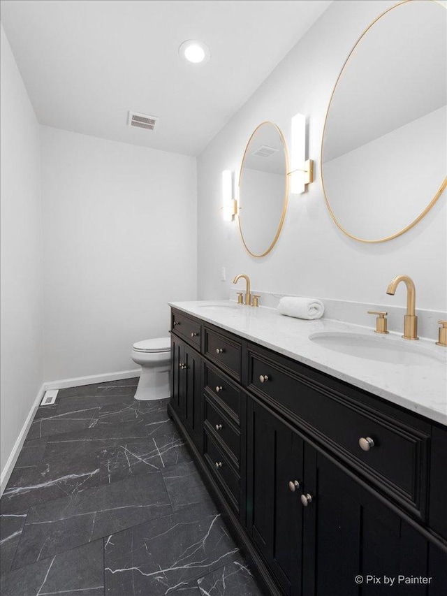 1520 Silver Maple Ct, Naperville, IL 60563 - bathroom with double vanity, marble finish floors, baseboards, toilet, and recessed lighting