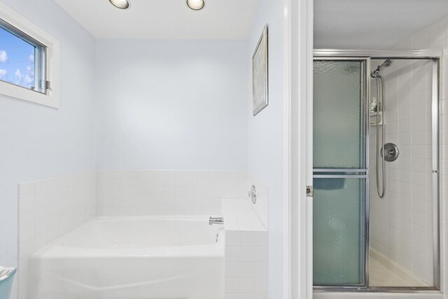 2625 Essington Rd Unit 2625, Joliet, IL 60435 - full bathroom with a stall shower, a garden tub, and recessed lighting