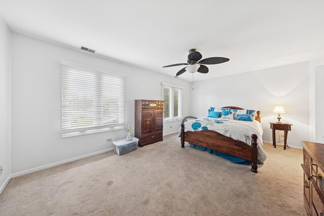 2625 Essington Rd Unit 2625, Joliet, IL 60435 - bedroom featuring carpet flooring, ceiling fan, and baseboards