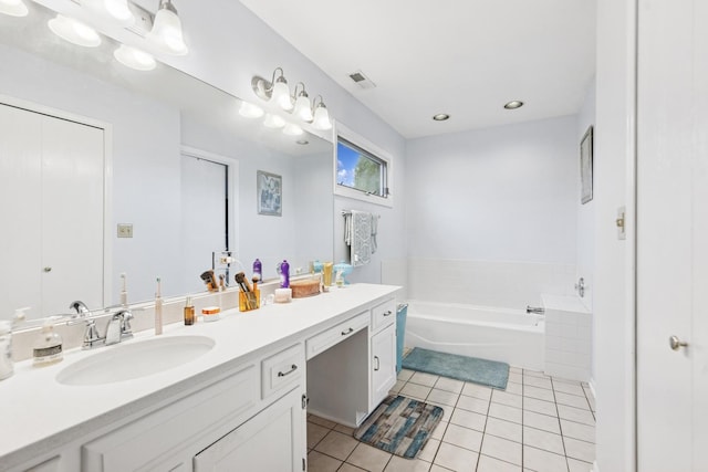 2625 Essington Rd Unit 2625, Joliet, IL 60435 - full bath with tile patterned floors, double vanity, a garden tub, and recessed lighting