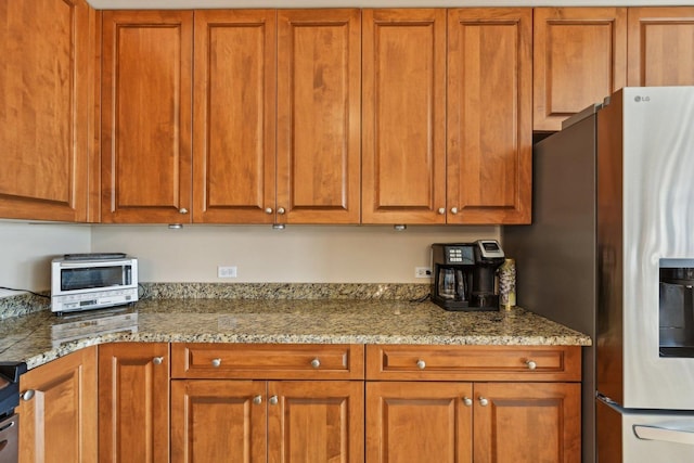170 N NW Hwy Unit 401, Park Ridge, IL 60068 - kitchen featuring stainless steel fridge with ice dispenser and brown cabinetry