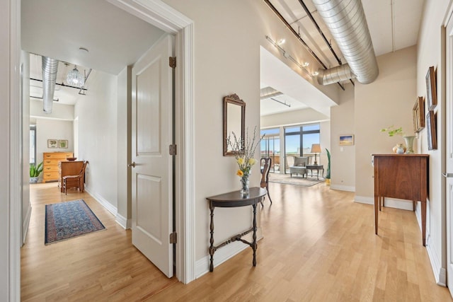 170 N NW Hwy Unit 401, Park Ridge, IL 60068 - hallway with baseboards and light wood-type flooring