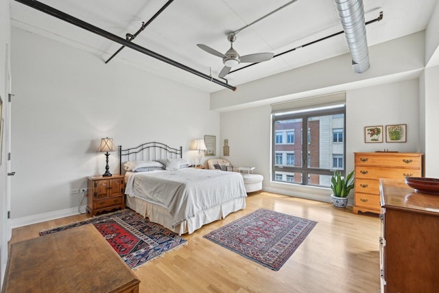 170 N NW Hwy Unit 401, Park Ridge, IL 60068 - bedroom with wood finished floors, baseboards, and a ceiling fan