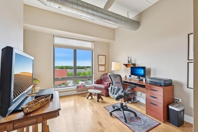 170 N NW Hwy Unit 401, Park Ridge, IL 60068 - office area with healthy amount of natural light, light wood-style flooring, and a towering ceiling