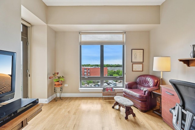 170 N NW Hwy Unit 401, Park Ridge, IL 60068 - sitting room featuring wood finished floors, baseboards, and an office area