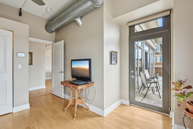 170 N NW Hwy Unit 401, Park Ridge, IL 60068 - entrance foyer featuring light wood finished floors, baseboards, and a towering ceiling
