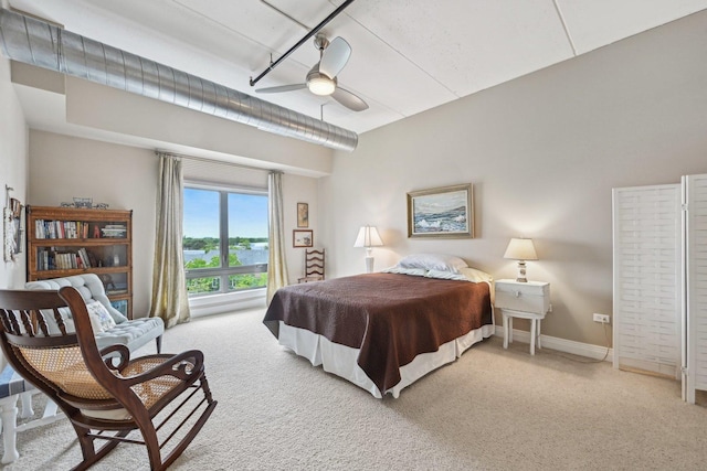 170 N NW Hwy Unit 401, Park Ridge, IL 60068 - bedroom featuring light colored carpet, ceiling fan, and baseboards