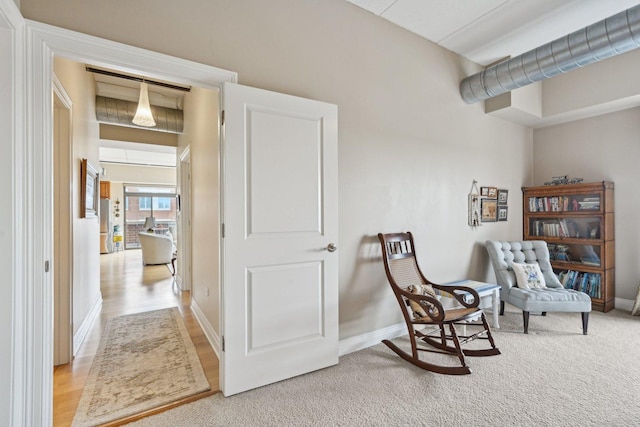 170 N NW Hwy Unit 401, Park Ridge, IL 60068 - living area featuring baseboards and light carpet