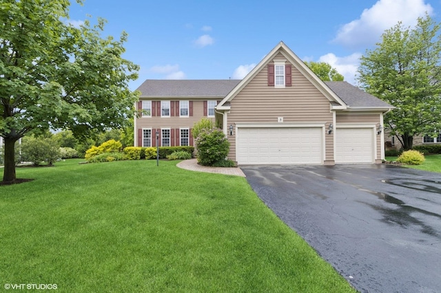 5 N Chestnut Ct, Hawthorn Woods, IL 60047 - view of front facade featuring asphalt driveway and a front lawn