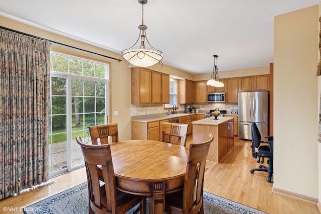 5 N Chestnut Ct, Hawthorn Woods, IL 60047 - dining space with plenty of natural light and light wood-style flooring
