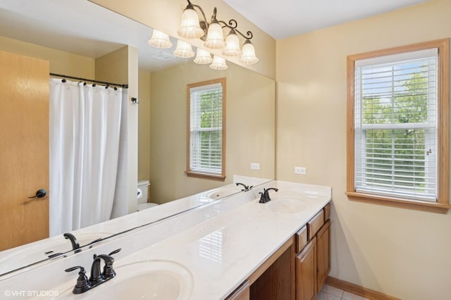5 N Chestnut Ct, Hawthorn Woods, IL 60047 - bathroom featuring double vanity, toilet, baseboards, a chandelier, and tile patterned floors