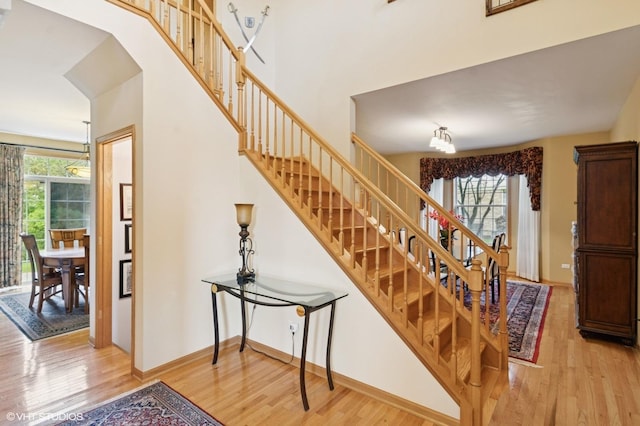 5 N Chestnut Ct, Hawthorn Woods, IL 60047 - stairs with wood finished floors and baseboards