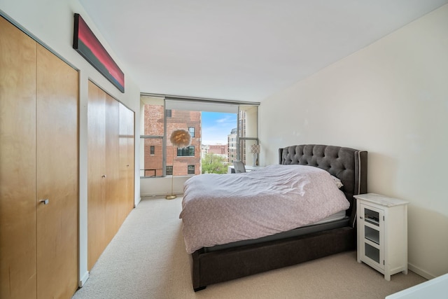 3200 N Lake Shore Dr Unit 911, Chicago, IL 60657 - bedroom featuring light colored carpet and baseboards
