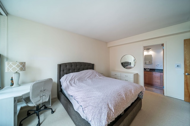3200 N Lake Shore Dr Unit 911, Chicago, IL 60657 - bedroom featuring light colored carpet, a desk, a sink, and connected bathroom