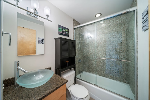 3200 N Lake Shore Dr Unit 911, Chicago, IL 60657 - full bathroom featuring vanity, toilet, and bath / shower combo with glass door