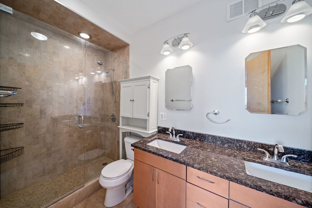 3200 N Lake Shore Dr Unit 911, Chicago, IL 60657 - full bathroom featuring a stall shower, double vanity, and toilet
