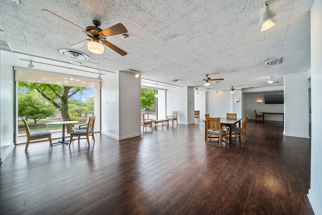 3200 N Lake Shore Dr Unit 911, Chicago, IL 60657 - dining room with ceiling fan, dark wood-style floors, and baseboards