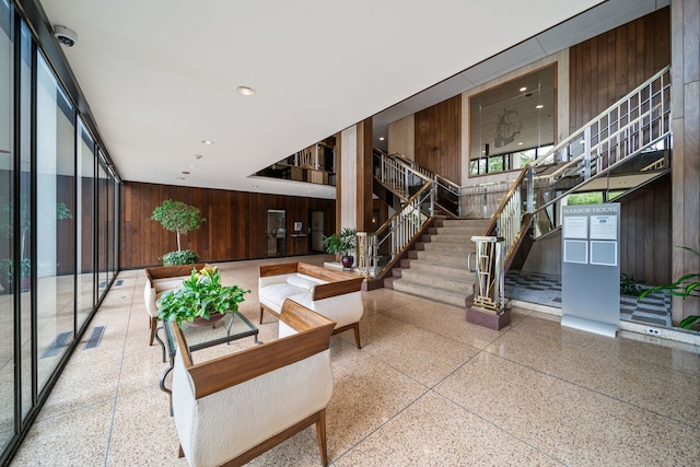 3200 N Lake Shore Dr Unit 911, Chicago, IL 60657 - lobby featuring wood walls, stairs, and recessed lighting