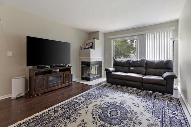 3092 Serenity Ln, Naperville, IL 60564 - living area featuring dark wood-style flooring, baseboards, and a fireplace