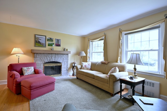 8 S Merrill, Park Ridge, IL 60068 - living area with a fireplace, radiator heating unit, crown molding, wood finished floors, and baseboards