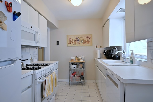 8 S Merrill, Park Ridge, IL 60068 - kitchen with white appliances, a sink, decorative backsplash, light countertops, and white cabinets