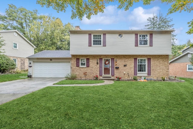 961 N Arrowhead Dr, Palatine, IL 60074 - colonial home with an attached garage, brick siding, a chimney, and a front lawn