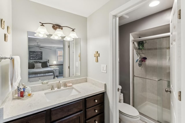 961 N Arrowhead Dr, Palatine, IL 60074 - bathroom featuring a ceiling fan, toilet, vanity, and a stall shower