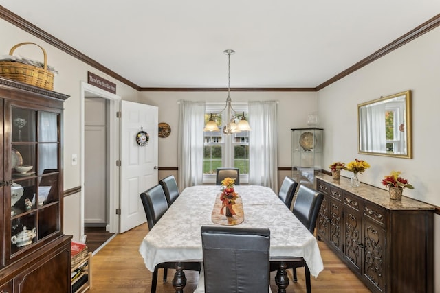961 N Arrowhead Dr, Palatine, IL 60074 - dining room featuring a chandelier, light wood-style flooring, and crown molding