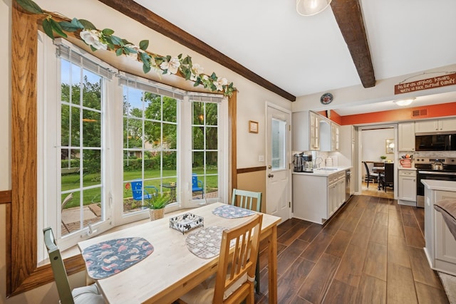 961 N Arrowhead Dr, Palatine, IL 60074 - dining area featuring beamed ceiling and dark wood-style flooring