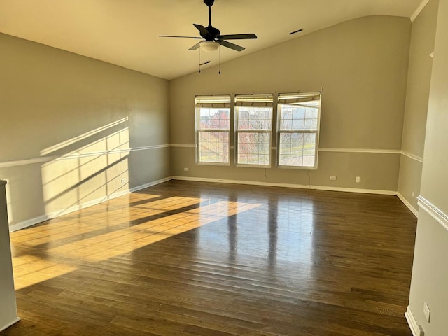 3292 Bromley Ln, Aurora, IL 60502 - empty room with lofted ceiling, wood finished floors, a ceiling fan, and baseboards