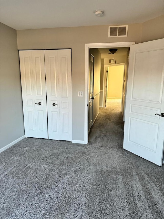 3292 Bromley Ln, Aurora, IL 60502 - unfurnished bedroom with dark colored carpet and baseboards