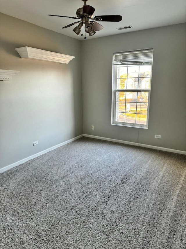 3292 Bromley Ln, Aurora, IL 60502 - unfurnished room featuring carpet flooring, ceiling fan, and baseboards