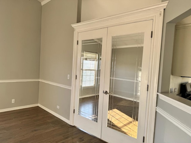 3292 Bromley Ln, Aurora, IL 60502 - doorway with french doors, dark wood finished floors, and baseboards