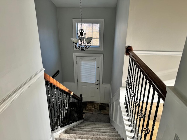 3292 Bromley Ln, Aurora, IL 60502 - stairway with a chandelier