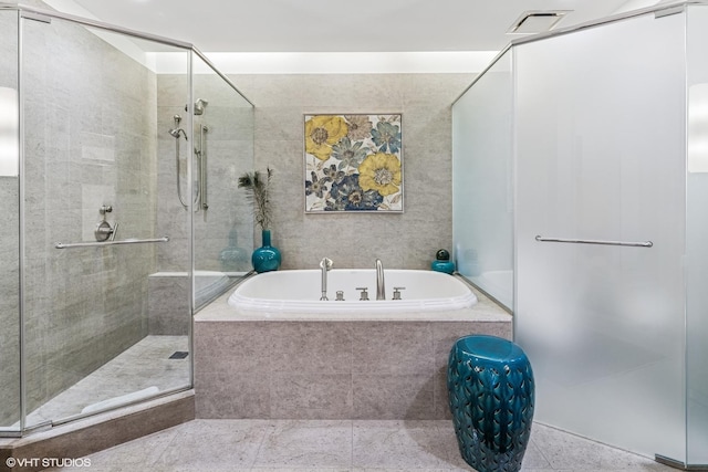401 N Wabash Ave Unit 54E, Chicago, IL 60611 - bathroom with a stall shower and a garden tub