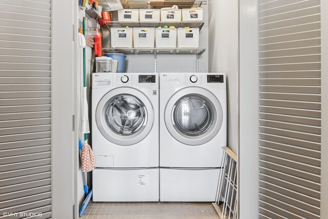 401 N Wabash Ave Unit 54E, Chicago, IL 60611 - washroom with washer and dryer