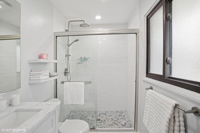2050 Beechnut Rd, Northbrook, IL 60062 - full bath with toilet, vanity, a stall shower, and recessed lighting