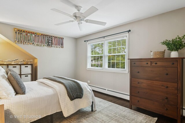 614 S Patton Ave, Arlington Heights, IL 60005 - bedroom featuring a baseboard heating unit, wood finished floors, a ceiling fan, and baseboards