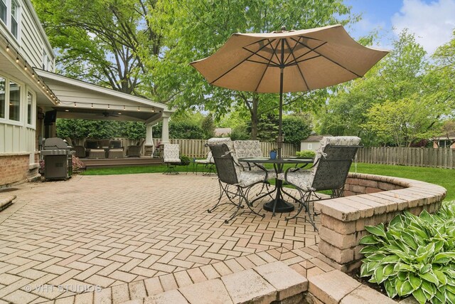 614 S Patton Ave, Arlington Heights, IL 60005 - fenced backyard featuring a patio area, outdoor dining space, a deck, and ceiling fan