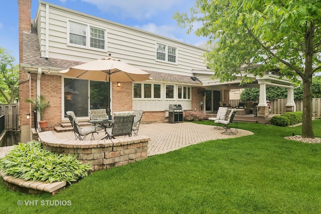 614 S Patton Ave, Arlington Heights, IL 60005 - back of house with brick siding, a patio area, and a shingled roof